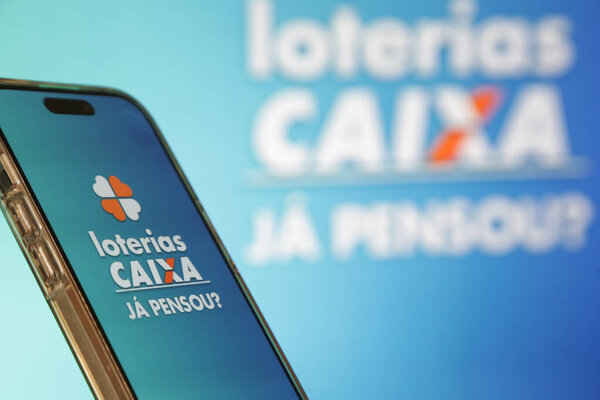 Lottery Draw in the Palm of Your Hand app with vibrant blue background.