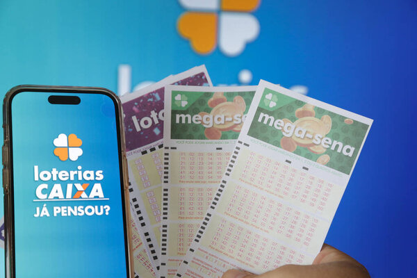 Lottery Draw in the Palm of Your Hand app with vibrant blue background.