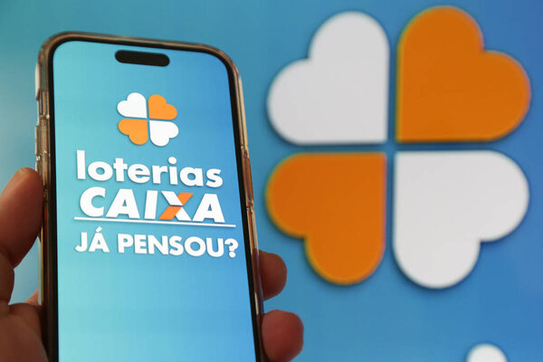 Lottery Draw in the Palm of Your Hand app with vibrant blue background.