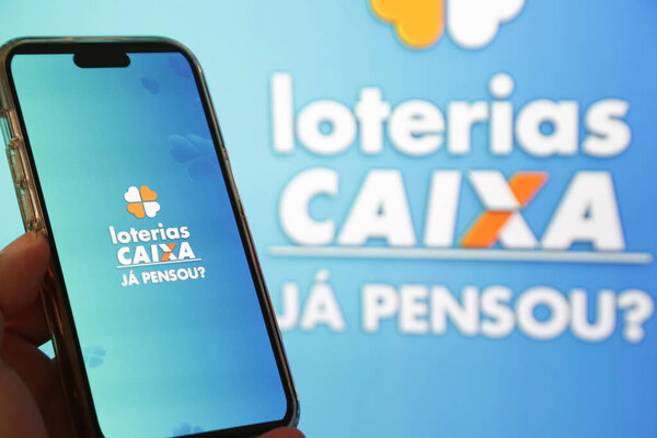 Lottery Draw in the Palm of Your Hand app with vibrant blue background.