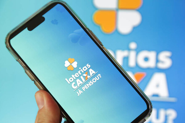 Lottery Draw in the Palm of Your Hand app with vibrant blue background.