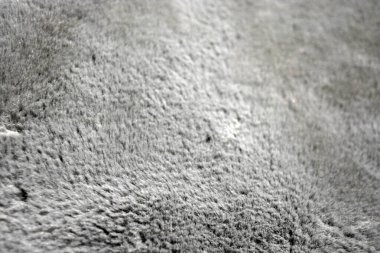 Fur fluffy background, synthetic, not natural gray fluffy fur.