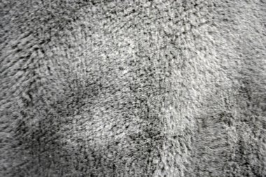 Fur fluffy background, synthetic, not natural gray fluffy fur.