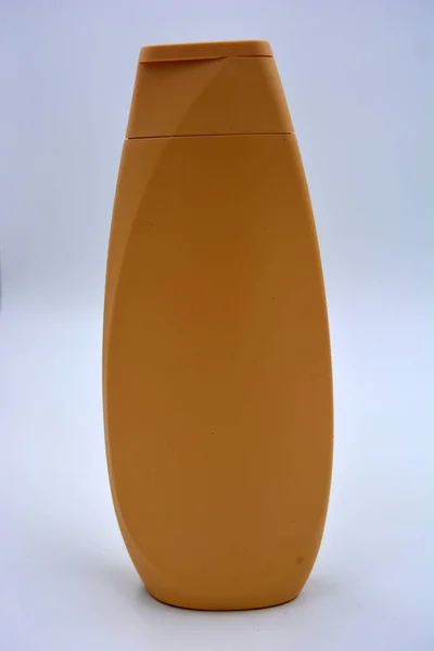 Красивая Коричневая Пластиковая Бутылка Упаковка Шампуня Крем Ухода Телом Расположен — стоковое фото