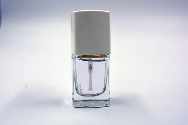 Esmalte Uñas Mujer Una Botella Vidrio Frambuesa Con Tapa Blanca — Foto de Stock