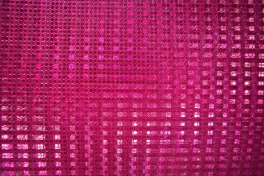 Sıradışı parlak pembe arka plan, hologram yansıtıcı etki, küçük parçacıklar yakın çekim.