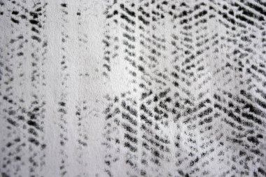 Lazer yazıcı tarafından yapılan siyah desenli temiz beyaz kağıda alışılmadık bir çizim. Grafikler, alışılmadık çizimler, doku, semboller, kancalar, kareler.