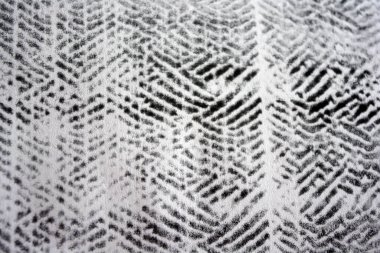 Lazer yazıcı tarafından yapılan siyah desenli temiz beyaz kağıda alışılmadık bir çizim. Grafikler, alışılmadık çizimler, doku, semboller, kancalar, kareler.