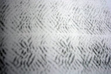 Lazer yazıcı tarafından yapılan siyah desenli temiz beyaz kağıda alışılmadık bir çizim. Grafikler, alışılmadık çizimler, doku, semboller, kancalar, kareler.