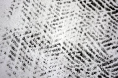 Lazer yazıcı tarafından yapılan siyah desenli temiz beyaz kağıda alışılmadık bir çizim. Grafikler, alışılmadık çizimler, doku, semboller, kancalar, kareler.