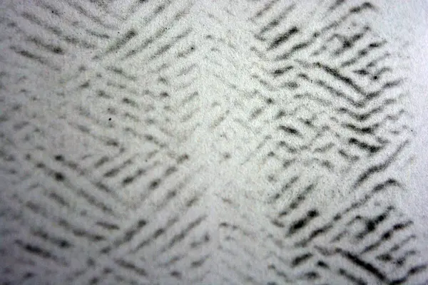 Lazer yazıcı tarafından yapılan siyah desenli temiz beyaz kağıda alışılmadık bir çizim. Grafikler, alışılmadık çizimler, doku, semboller, kancalar, kareler.