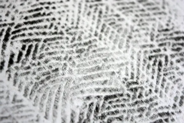 Lazer yazıcı tarafından yapılan siyah desenli temiz beyaz kağıda alışılmadık bir çizim. Grafikler, alışılmadık çizimler, doku, semboller, kancalar, kareler.