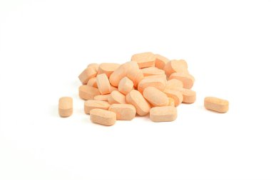 Yakından izole edilmiş bir görüntü yığını, C vitamini ilaç ürünü. Vücudun sağlıklı beslenmesi için ilaç.. 
