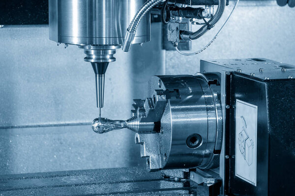 The  4-axis machining center rotary table cutting the sample parts with solid ball end mill tool. The hi-technology multi-axis CNC milling machine manufacturing process.