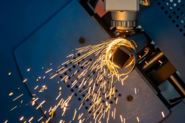 The fiber laser cutting machine cutting  machine cut the stainless steel tube. The hi-technology sheet metal manufacturing process by laser cutting machine. 