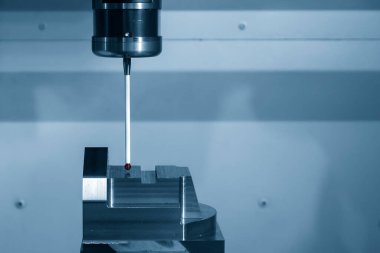 The  CMM probe measuring the injection mold parts on machining center. The quality control of automotive parts with  Coordinate Measuring Machine.