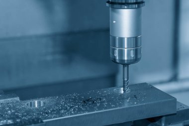 The CNC milling machine bore cutting metal part by solid ball end mill tool. The mold parts cutting process by machining center with solid ball end mill.