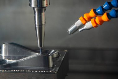 The CNC milling machine cutting injection mold part with oil mist coolant method .The mold parts cutting process by machining center with solid ball end mill.