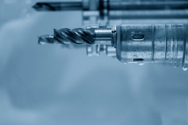 Close-up scene the flat end mill cutter for CNC milling machine. The  cutting  tool for machining center.