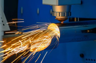 The fiber laser cutting machine cutting  machine cut the stainless steel tube. The hi-technology sheet metal manufacturing process by laser cutting machine. 