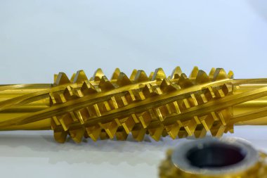 Close up scene the hobbing cutter. The gear manufacturing process by hobbing process.