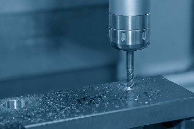 The CNC milling machine bore cutting metal part by solid ball end mill tool. The mold parts cutting process by machining center with solid ball end mill.