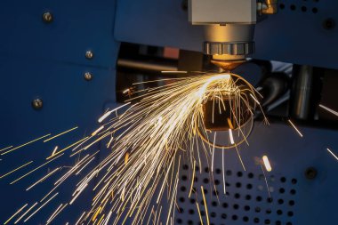 The fiber laser cutting machine cutting  machine cut the stainless steel tube. The hi-technology sheet metal manufacturing process by laser cutting machine. 