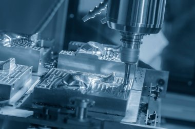 CNC değirmen makinesi, enjeksiyon küf parçalarını indekslenebilir araçlarla kesiyor. Kalıplar ve ölüm üretim süreci, son değirmen araçları ile makine merkezi tarafından.