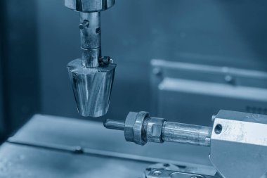 Close up operation of the sinker EDM machine. The mold and die manufacturing concept by EDM machine.