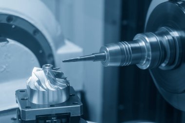 The 5-axis CNC milling machine  cutting the turbocharger part with solid ball end mill tool. The hi-technology automotive  parts manufacturing process by 5-axis machining center.