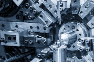Close up scene the coil spring machine in light blue. The mechanical parts manufacturing concept.