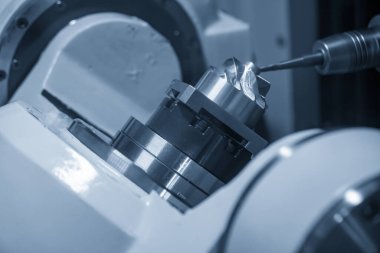 The 5-axis CNC milling machine  cutting the turbocharger part with solid ball end mill tool. The hi-technology automotive  parts manufacturing process by 5-axis machining center.