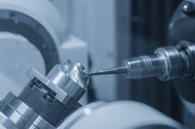 The 5-axis CNC milling machine  cutting the turbocharger part with solid ball end mill tool. The hi-technology automotive  parts manufacturing process by 5-axis machining center.