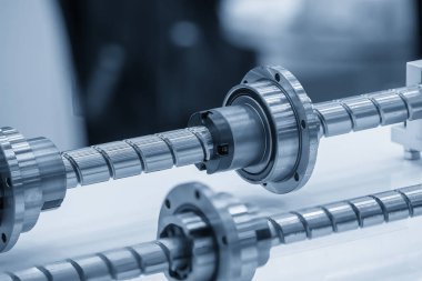Closeup scene the spare parts  lead ball screw set. The hi-precision CNC machine part manufacturing concept.