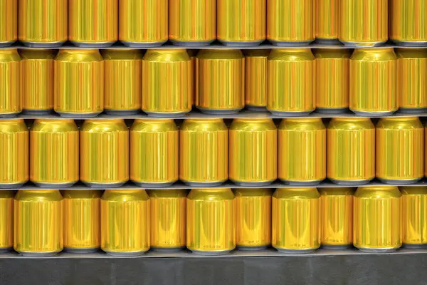stock image The pallet of gold aluminum cans. The can drinking  delivery process at the warehouse. 