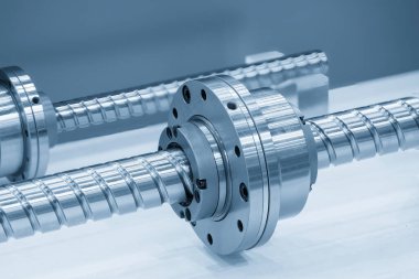 Closeup scene the spare parts  lead ball screw set. The hi-precision CNC machine part manufacturing concept.