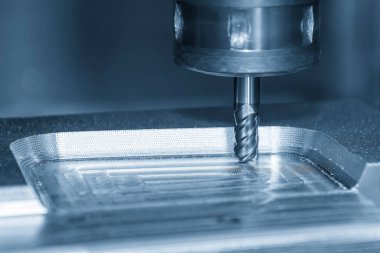 CNC Değirmen Makinesi, matbaayı kesiyor. Boğa burunlu değirmen aletinden ölüyor. Kalıplar, sert top değirmeni ile makine merkeziyle kesme işlemi yapıyor.