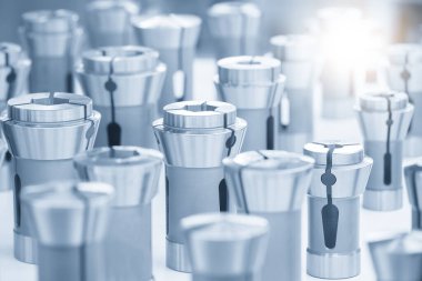 Açık mavi sahnedeki CNC üniversitelerinin çeşitli türlerini kapatıyoruz. Makine merkezi için araç tutucu ve standart ekipman.