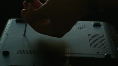 Hands fixing motherboard of pc or laptop notebook in service