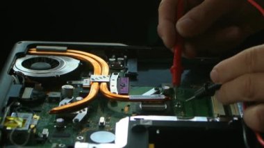 Hands fixing motherboard of pc or laptop notebook in service