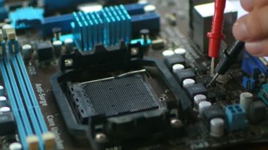 Hands fixing motherboard of pc or laptop notebook close in service