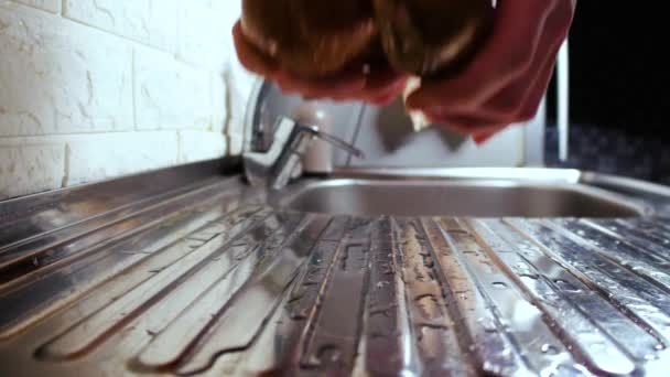Wet Potatoes Rolling Kitchen Sink Close — Stock Video