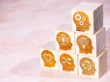 Soft power skills symbols on wooden cubes as concept of new form of management clipart