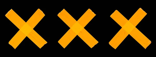 Cross Folded Crosses Orange Adhesive Tape Isolated Black Background — Stock Photo, Image