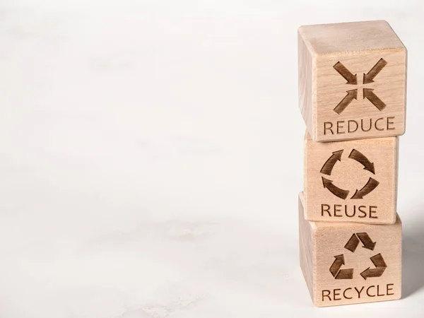 Reduce, Reuse, and Recycle symbols as an environmental conservation concept