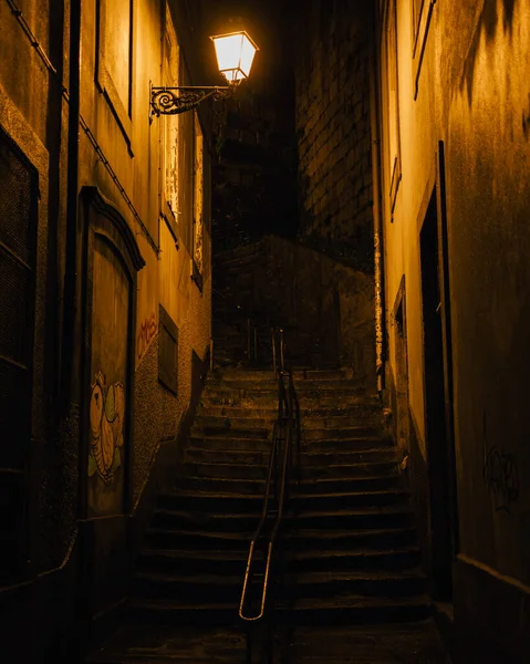 Dark alley with stairs in the historic part city center of porto , Portugal.