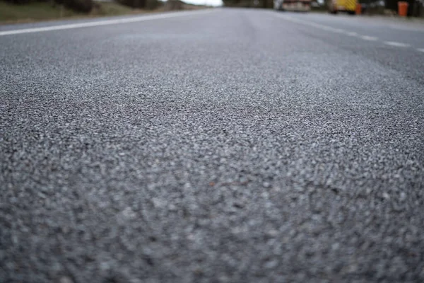 stock image close-up of new asphalt road.