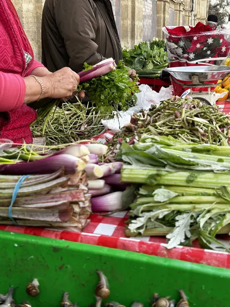 Close up of local market stall with fresh vegetables in Spain.