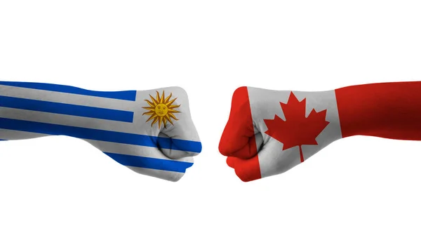 カナダVs Uruguay手フラグ男手パターンサッカーワールドカップ — ストック写真