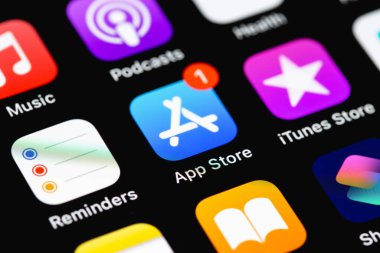 AppStore, iTunes, Apple music, Podcasts mobile apps icons on screen iPhone smartphone closeup. Apple Inc. is an American multinational technology company. Batumi, Georgia - October 6, 2022 clipart